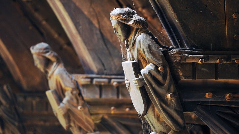 Carved wooden spandrel in the hammerbeam roof of the Great Hall at Rufford Old Hall, Lancashire